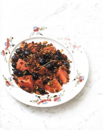 Grapefruit with granola and berries