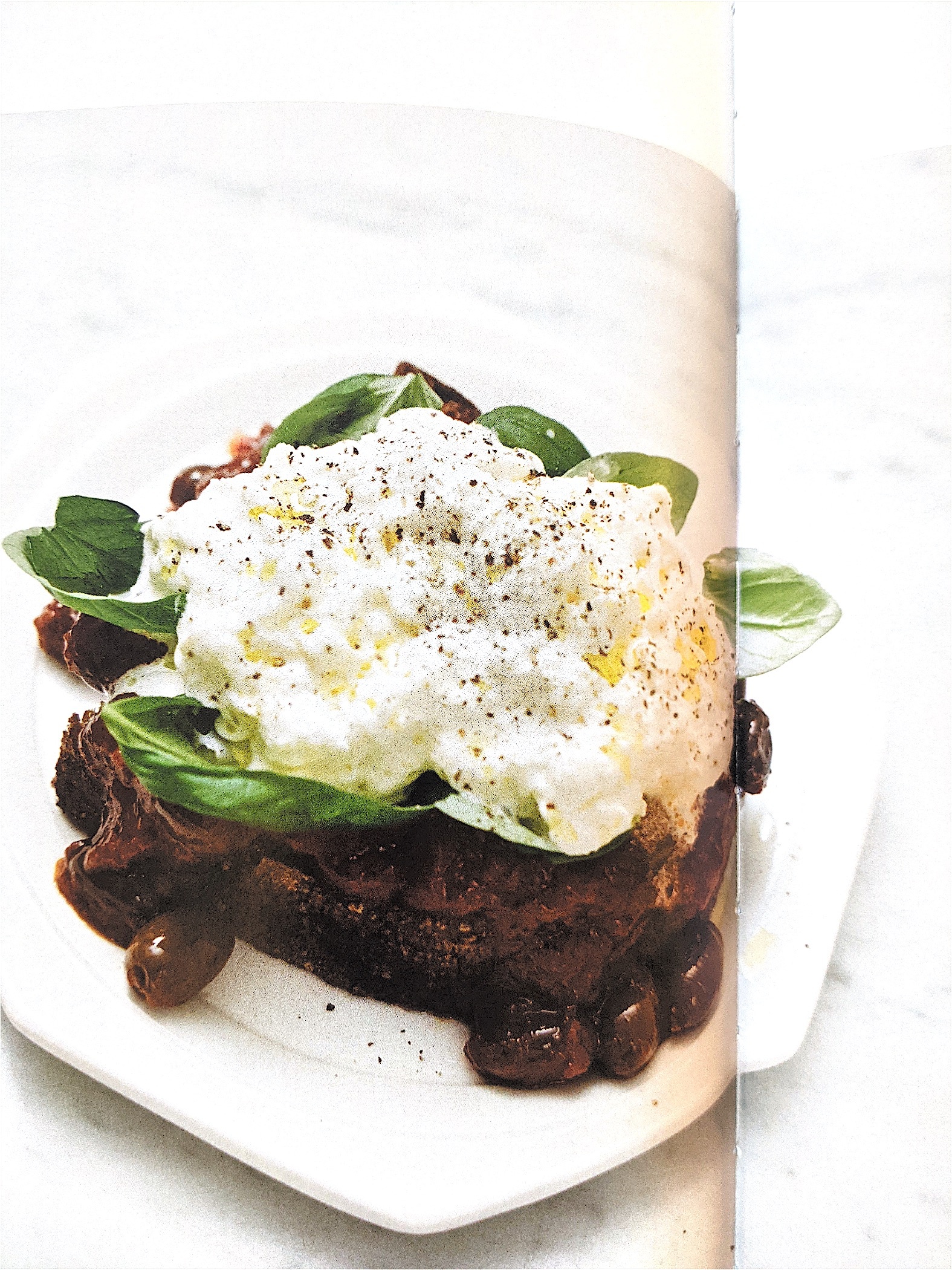Sourdough toast with puttanesca and stracciatella
