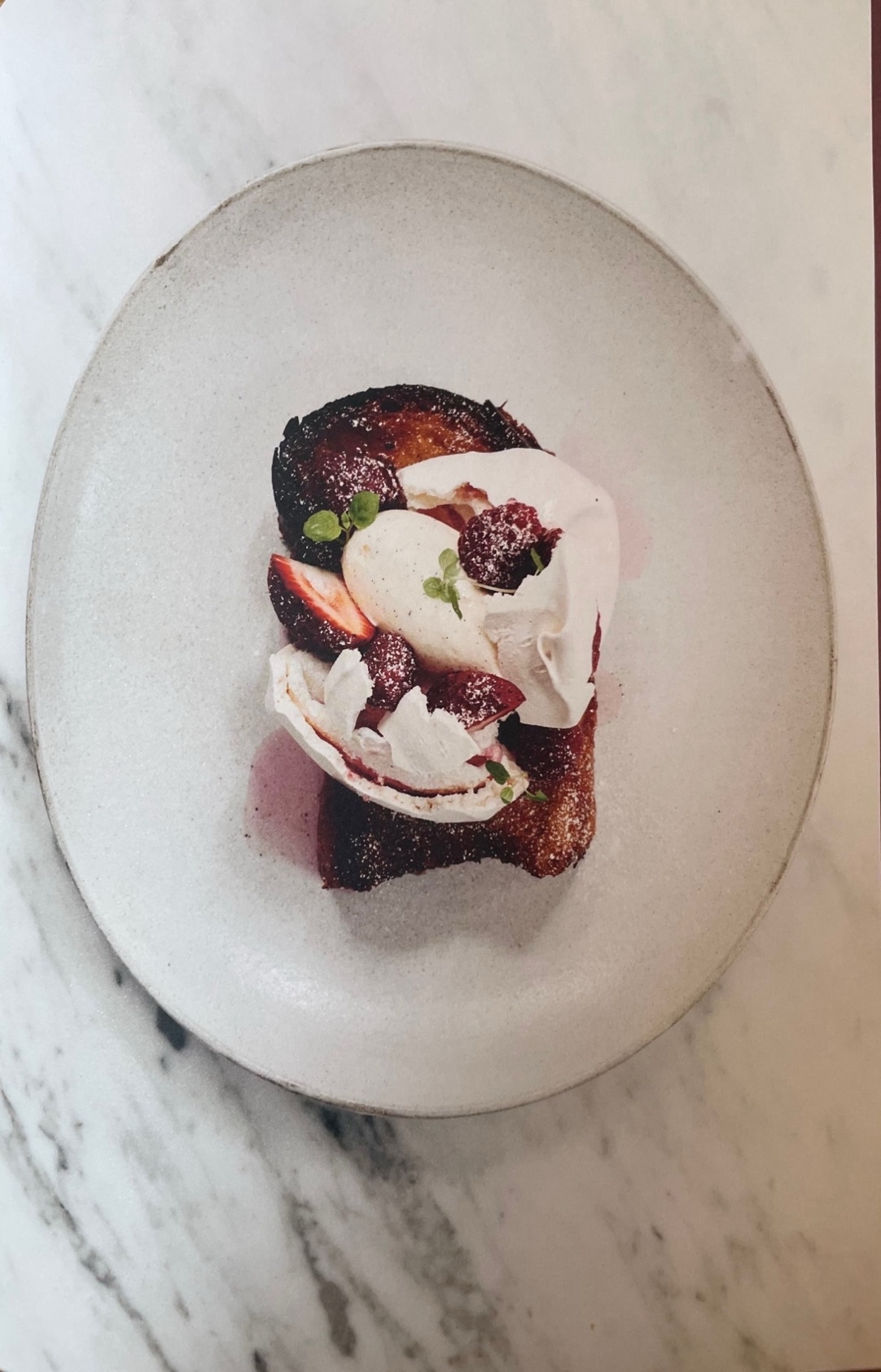 Fried brioche, vanilla meringue, chantilly cream, fresh berries, hibiscus syrup