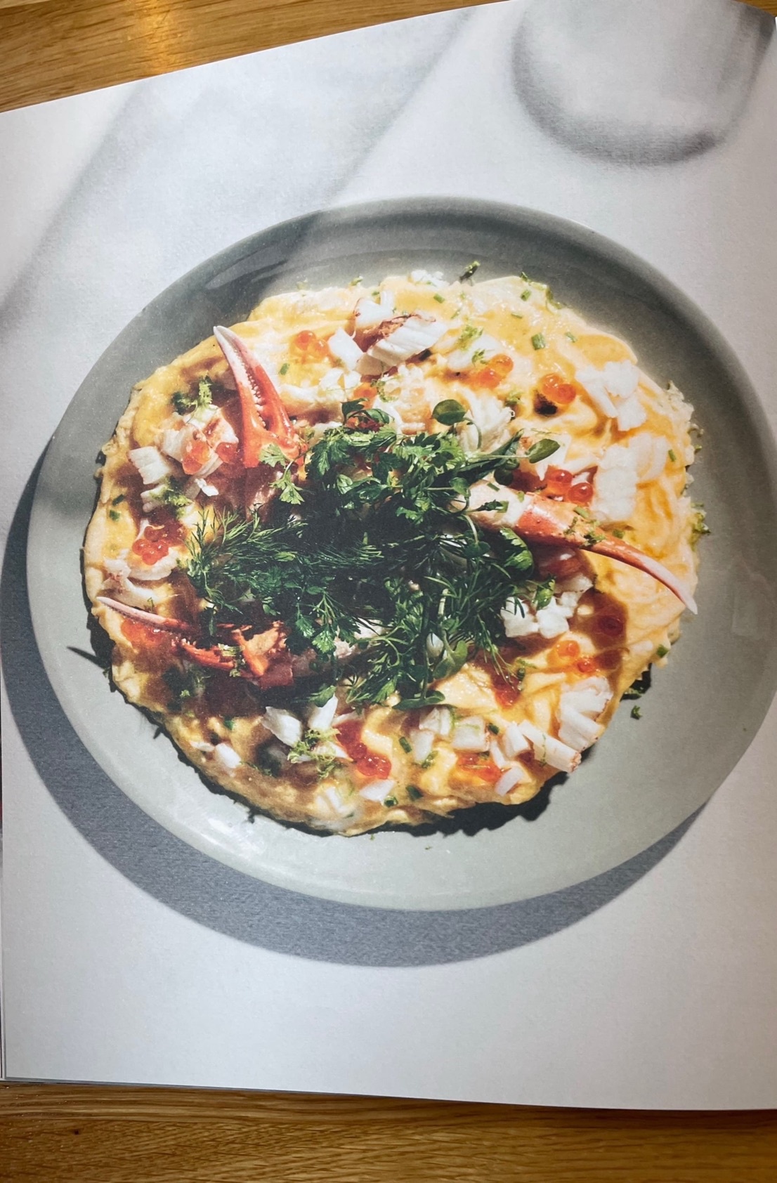 Crab omelette with salmon caviar, lime zest & herb salad