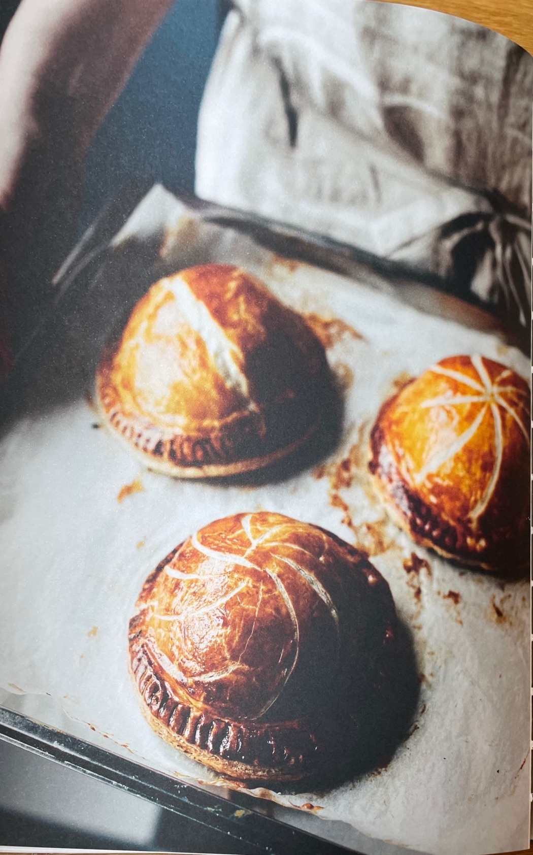 Duck & mushroom pithivier with celeriac purée, wilted spinach & jus gras